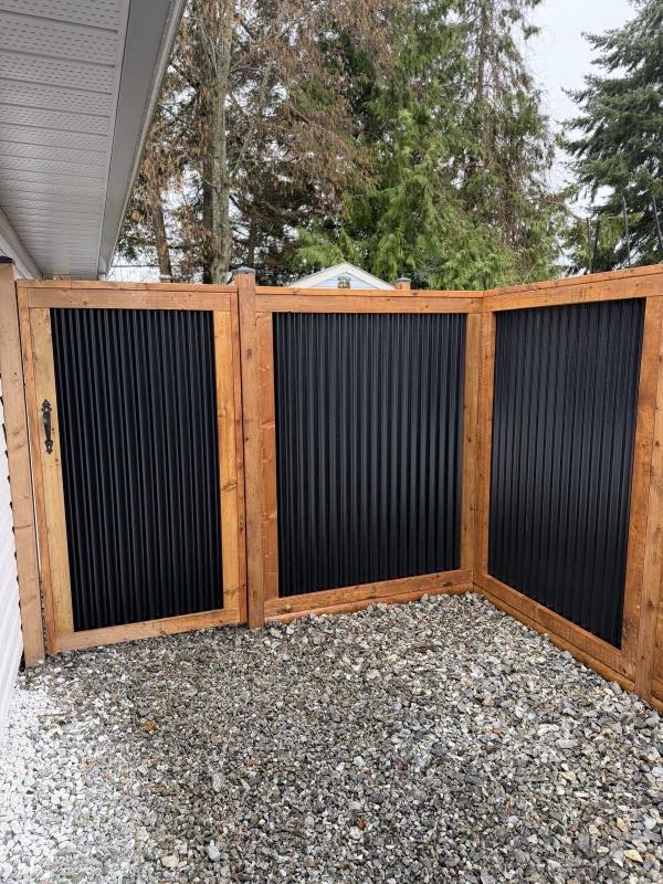 Metal fence project by Tonella Contracting on Vancouver Island