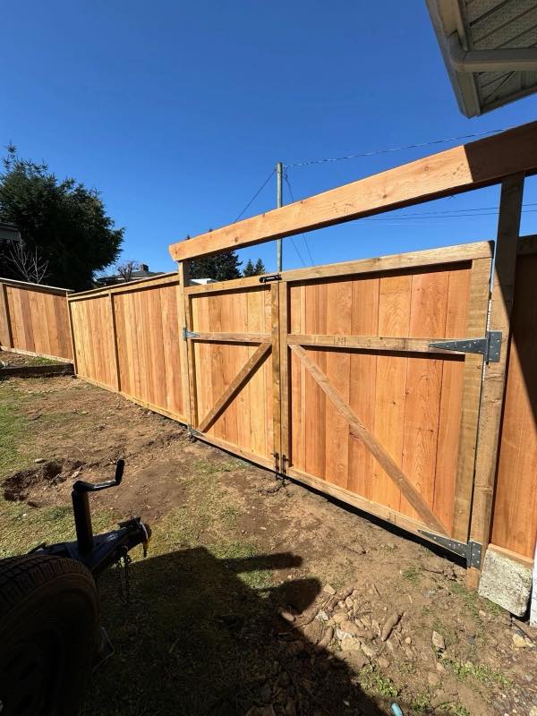Double swing gate project by Tonella Contracting on Vancouver Island