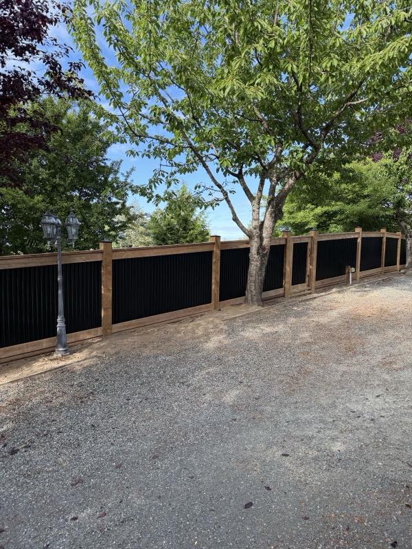 Metal fence project by Tonella Contracting on Vancouver Island