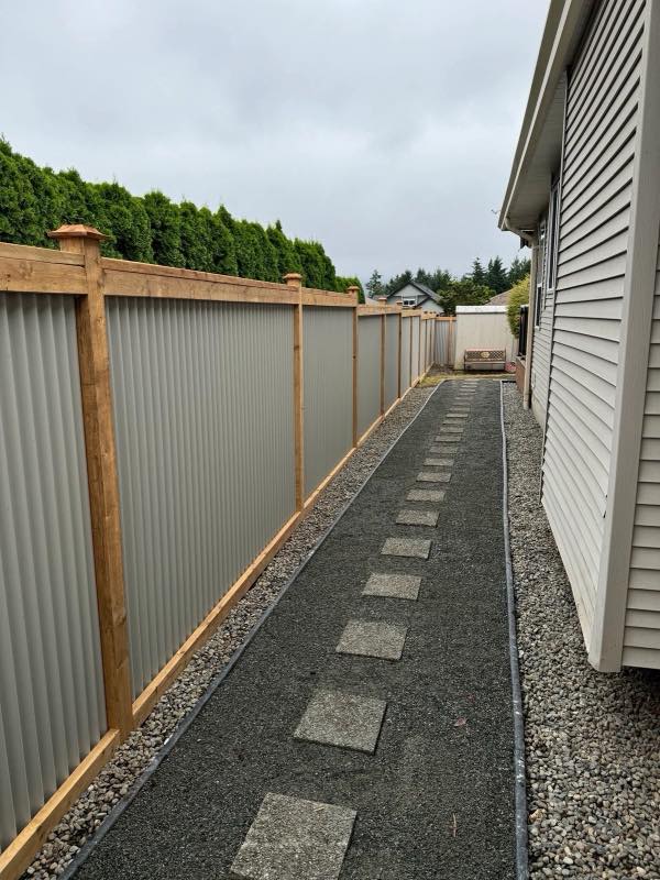 Metal fence project by Tonella Contracting on Vancouver Island