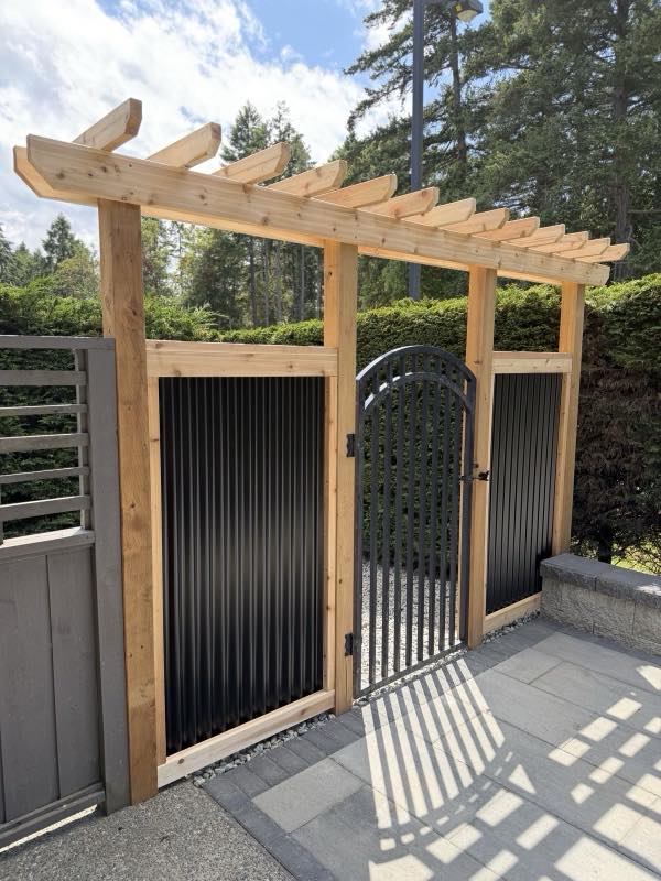 Cedar arbour over a pedestrian gate
