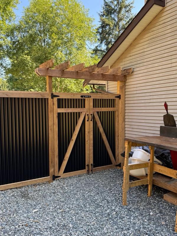 Double swing gate project by Tonella Contracting on Vancouver Island