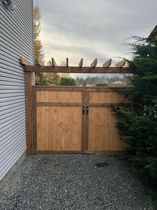 Double swing gate project by Tonella Contracting on Vancouver Island