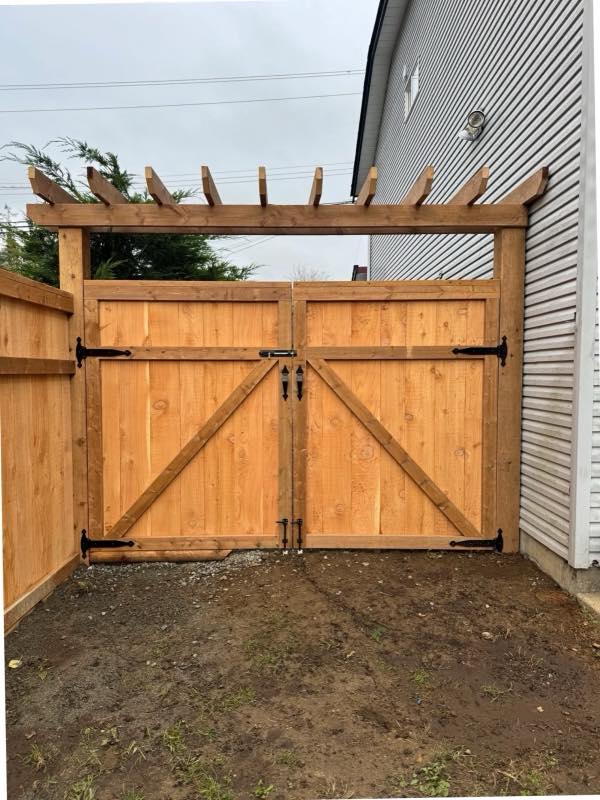 Double swing gate project by Tonella Contracting on Vancouver Island
