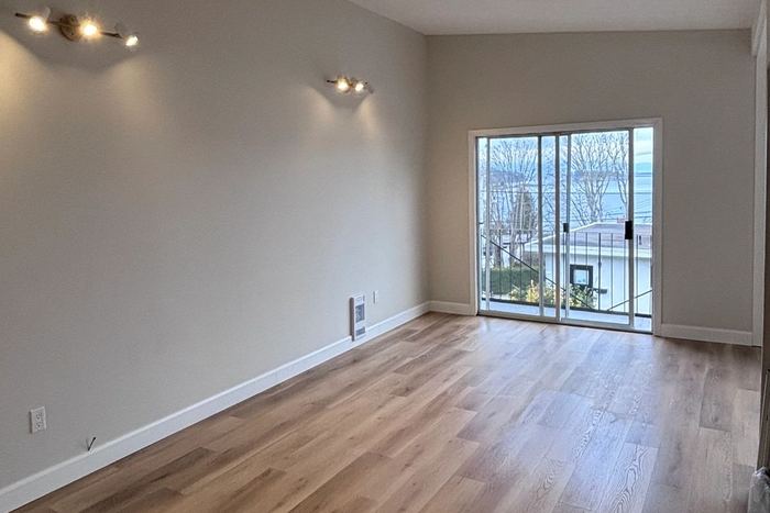 Finished interior renovation with new flooring by Tonella Contracting