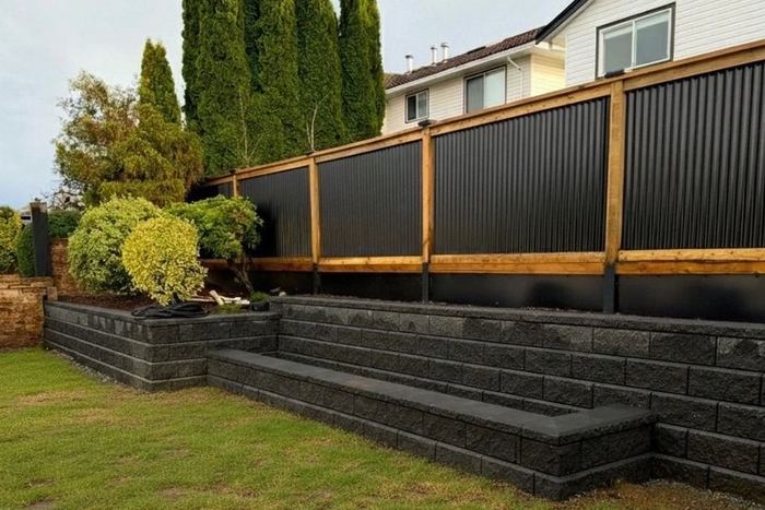 Block retaining wall with steps built by Tonella Contracting